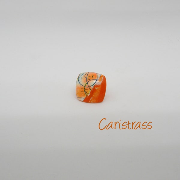 Bague en pâte polymère orange dessin géométrique