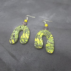 Fancy green and yellow textured polymer clay earrings in an original shape
