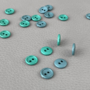 Round button 2 holes 12 mm decreasing price
