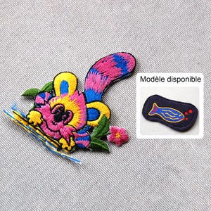 Embroidered iron-on or sew-on badge