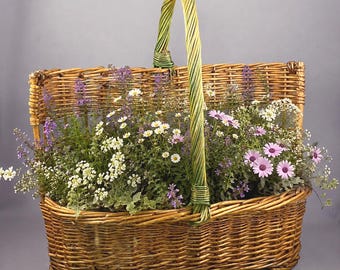 Vintage wicker basket with large handle, rustic country decoration