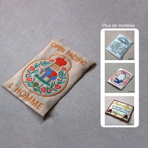 Iron-on or sew-on badge, reduced price