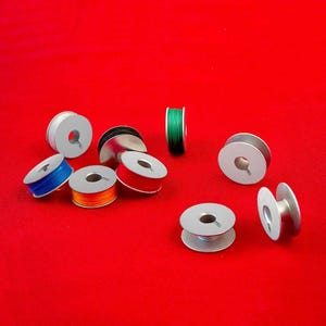 Universal bobbin for domestic or industrial sewing machine, decreasing price