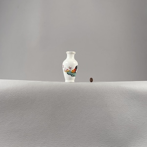 Miniature Chinese vase in vintage white porcelain