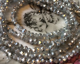 Sautoir extra long mi-argent mi-transparent vintage en perles rondelles de cristal facetté (120cm), reflets, éclats, scintillements