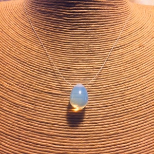 Invisible opaline/opalite drop necklace, round drop pendant, white-blue opal reflections on ultra-thin cable, minimalist