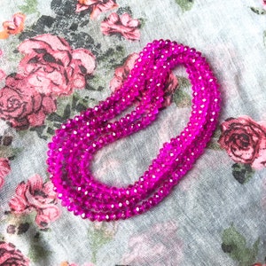 collana sautoir extra lunga (110cm) fucsia trasparente vintage in perle rondelle di cristallo sfaccettato (4x6mm), riflessi, scintillii, scintillii