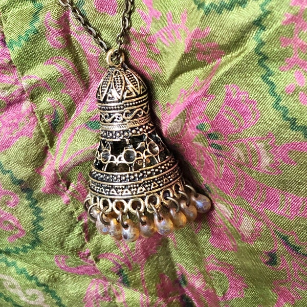 Indian gilt bronze bell pendant taken from the Jhumka Jhumki earrings worn by maharanis and revisited by Bollywood
