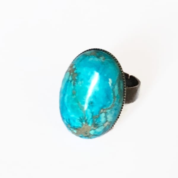 Bague bleu turquoise et bronze à cabochon ovale en jaspe océan sur support ajustable. Vintage, nature, mer. Chaque pierre est unique.