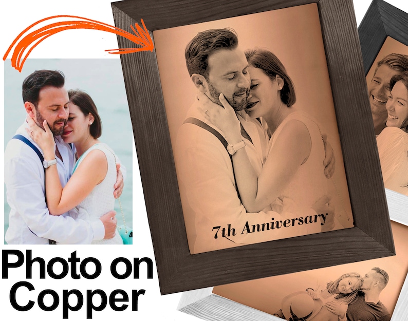 May include: A framed photo on copper with a couple embracing. The photo is in a sepia tone and has the text "7th Anniversary" engraved below the image.