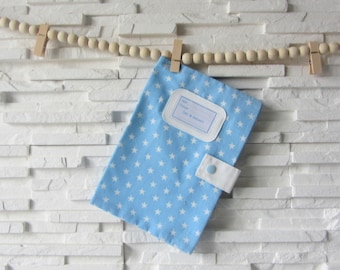 Protects blue health notebook with white stars
