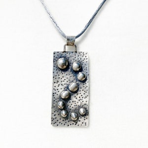 Mr. DNA pendant