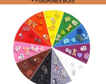 May include: A colorful felt circle with 11 sections, each a different color, with wooden buttons featuring various animal and object designs. The text "CERCLE TISSU 11 COULEURS + FIGURINES BOIS" is printed at the top of the image.