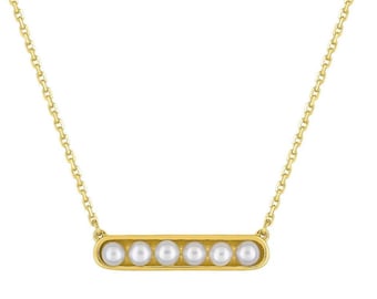 Necklace in 18 carat yellow gold, bar of cultured pearls