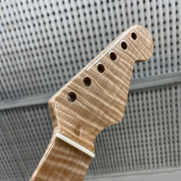 Breathtaking one piece flame maple S neck