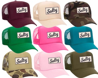May include: Ten trucker hats in various colors with a white patch that says "Salty" in a navy blue script font.