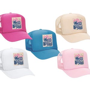 May include: Five trucker hats in various colors: hot pink, tan, blue, white, and light pink. Each hat features a rectangular patch with the text "Salty Vibes" above a beach scene with palm trees and waves.