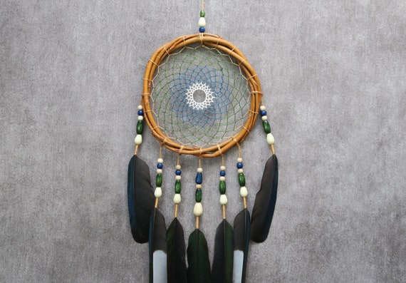 Black Feather Helmet with Silver Jewel and Braiding Plume Black Feather Helmet with Silver Jewel and Braiding Plume