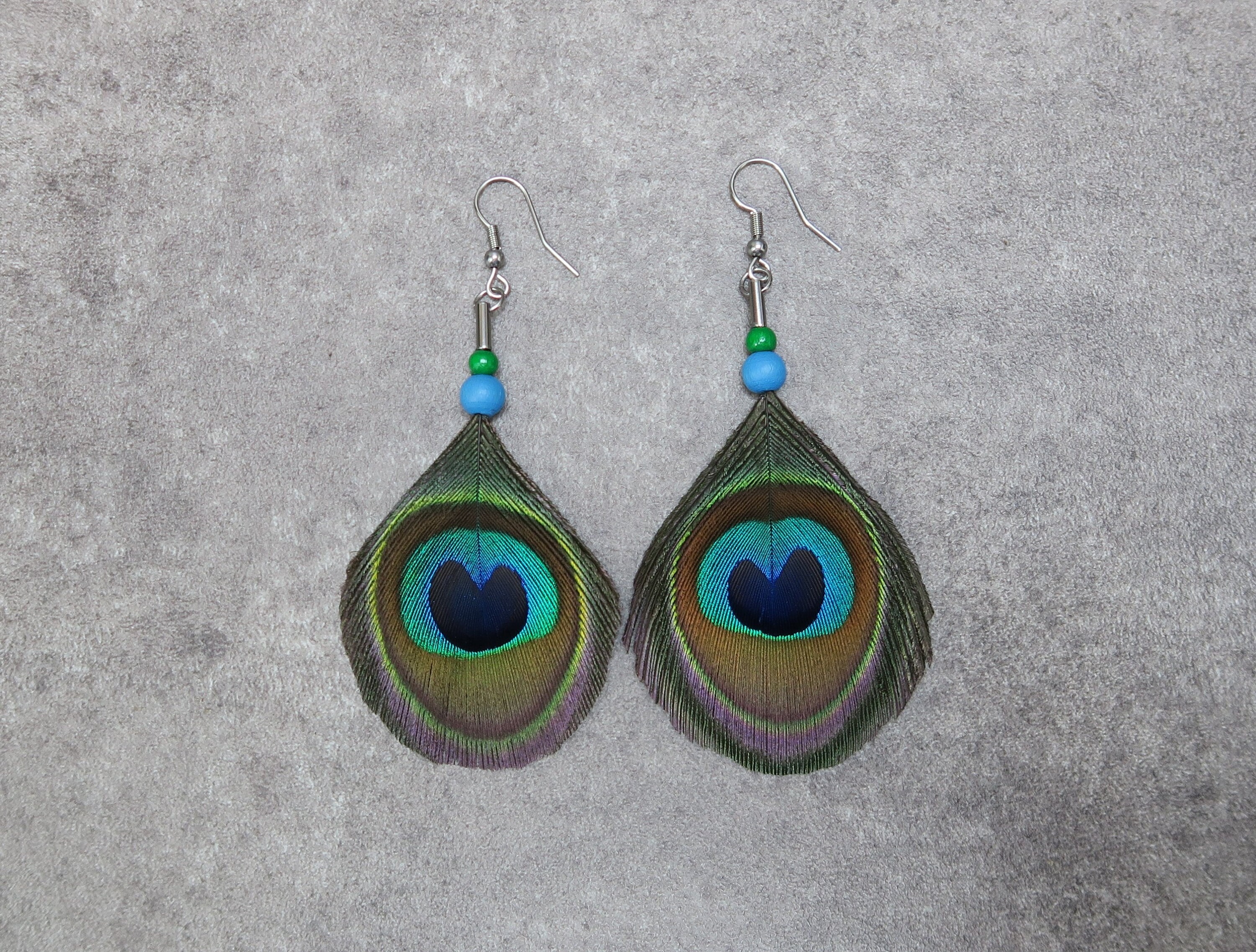 Boucles d'orelles plume de Paon naturelle , plaqué or. - Etsy France