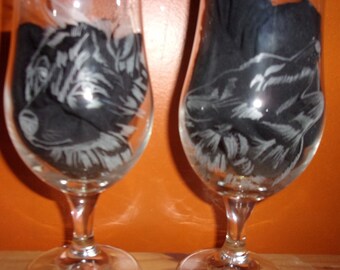 2 wolf pattern beer glasses