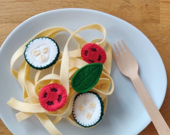 My little felt dishes: tagliatelle, zucchini, cherry tomatoes, basil