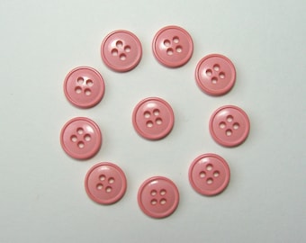 Boutons ronds 11,5 mm synthétique  rose 4 trous vendus par lot de 30 pièces créations couture.