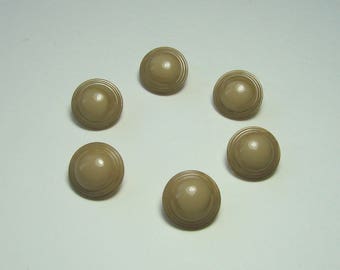 Boutons ronds 12 mm  fantaisie à patte beige synthétique  vendus par lot de 12 créations couture