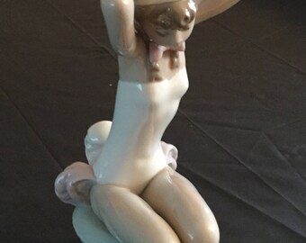 Lladro Girl with Bunny Outfit Figurine