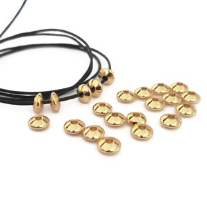 x10 24 Karat vergoldete Untertassenperlen aus Edelstahl, 5,5 x 3 mm, goldene Abstandsperlen, flache vergoldete Edelstahlperlen