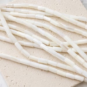 Natural mother-of-pearl tube beads, 8x4mm, shell, husk, jewelry making in natural white mother-of-pearl. Strand approximately 37cm long. image 1