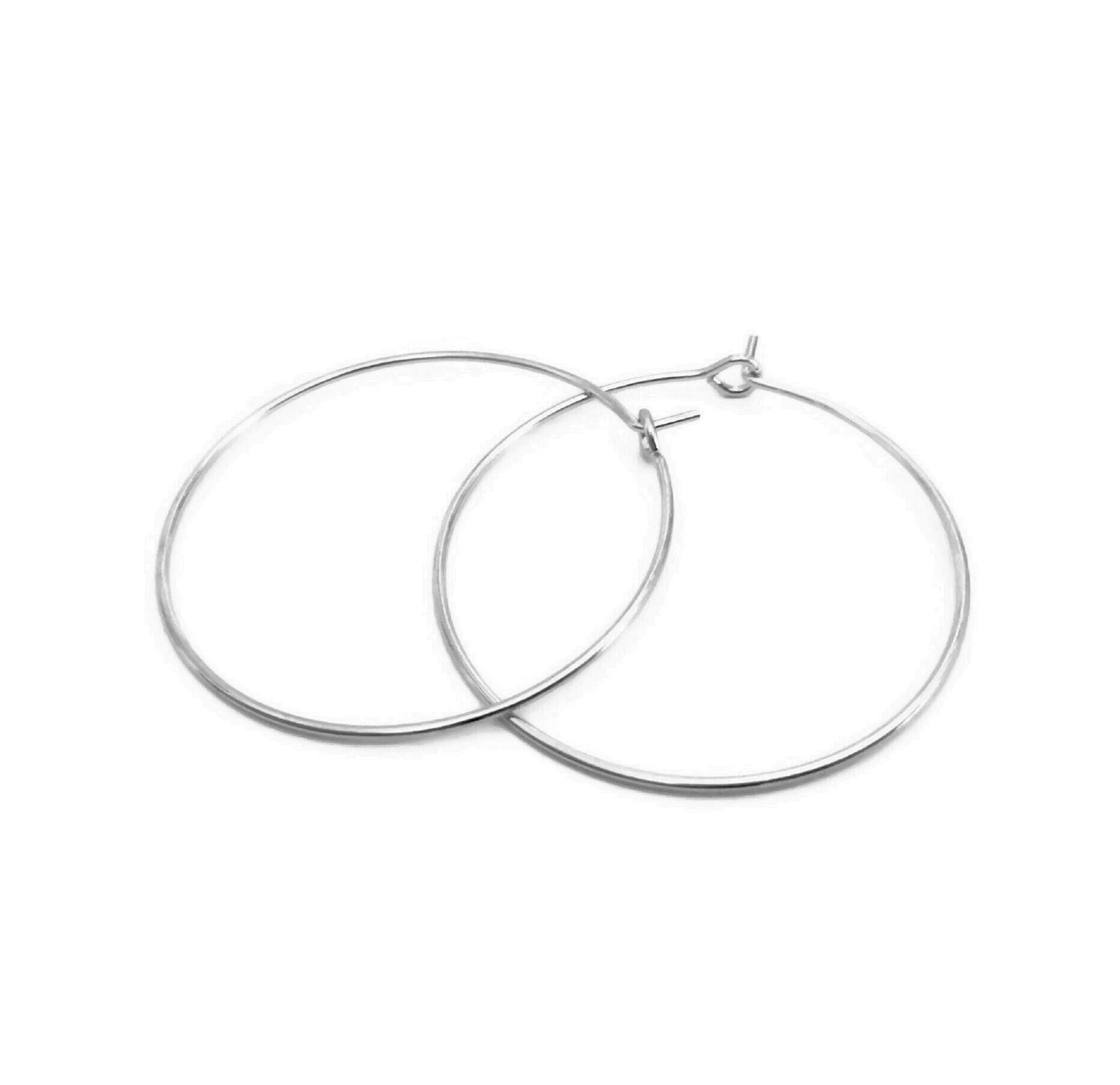 x10 Creoles in silver stainless steel, 25/30/35/40mm, supports earrin…