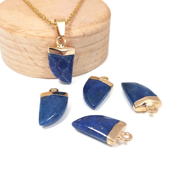 Pendentif en lapis lazuli, pierre taillée en forme dent de requin / corne . Vendu à l'unité