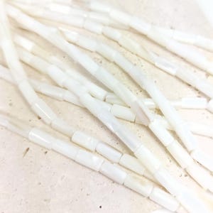 Natural mother-of-pearl tube beads, 8x4mm, shell, husk, jewelry making in natural white mother-of-pearl. Strand approximately 37cm long. image 5