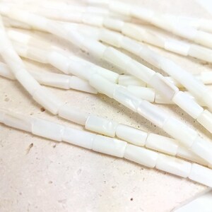 Natural mother-of-pearl tube beads, 8x4mm, shell, husk, jewelry making in natural white mother-of-pearl. Strand approximately 37cm long. image 3