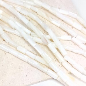 Natural mother-of-pearl tube beads, 8x4mm, shell, husk, jewelry making in natural white mother-of-pearl. Strand approximately 37cm long. image 4