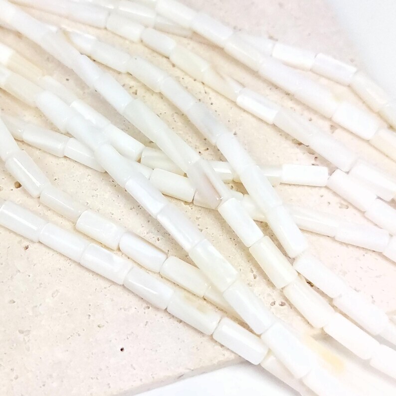 Natural mother-of-pearl tube beads, 8x4mm, shell, husk, jewelry making in natural white mother-of-pearl. Strand approximately 37cm long. image 4