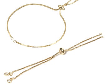 Bracelet en acier inoxydable doré, chaîne réglable avec sa perle coulissante, petits zircons aux extrémités