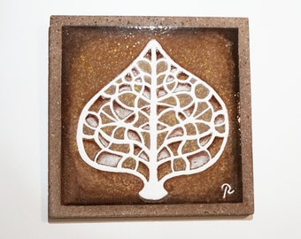Tableau nervures de feuilles stylisées en lave du Cantal émaillée 35X35cm