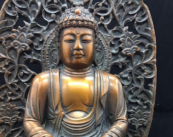 copper and bronze Buddhist statue Buddha Amitabha.
