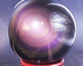 Exceptional sphere in obsidian eye celeste quality A. 0.307 kg 19.5cm in circumference 62mm in diameter