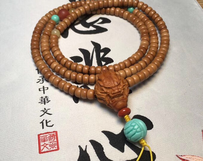 Mala Buddhist rosary 108 pearl white sandalwood beads hand-carved dragon in an olive core of Brazil