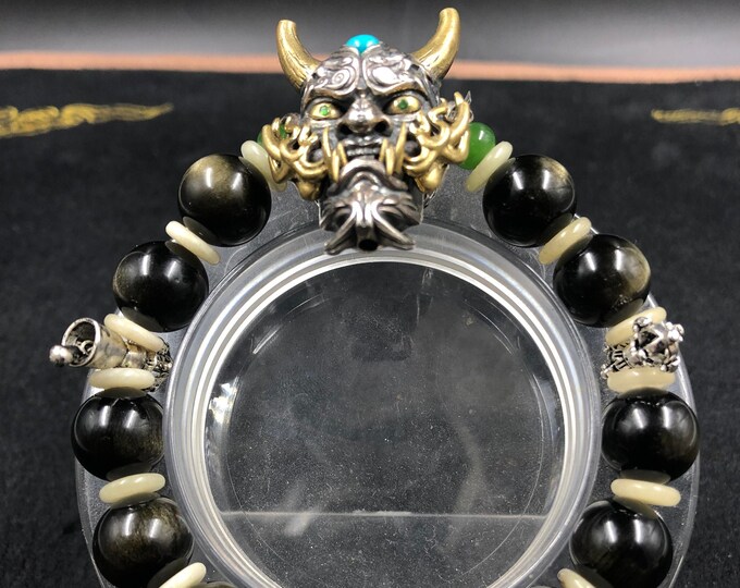 Bracelet, Hannya demon Japanese. obdsidienne doree has cat eye effect, silver 925, turquoise, jade, bone, garnet Tsavorite