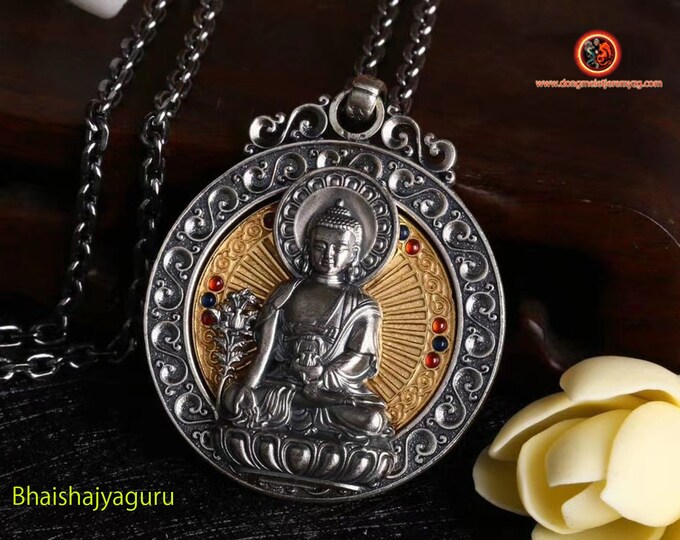Buddhist Buddha Bhaishajyaguru amulet protective pendant rotating wheel on the back of the Buddha, Tibetan mantra on the back of the amulet.