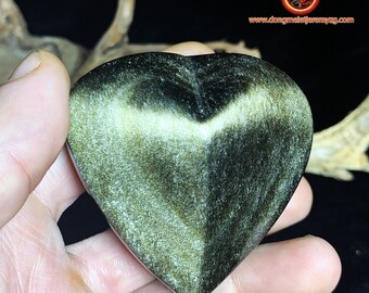 golden obsidian heart.  Originally from Mexico.  Quality A+ Dimensions of 65/66/38mm weight of 0,177kg