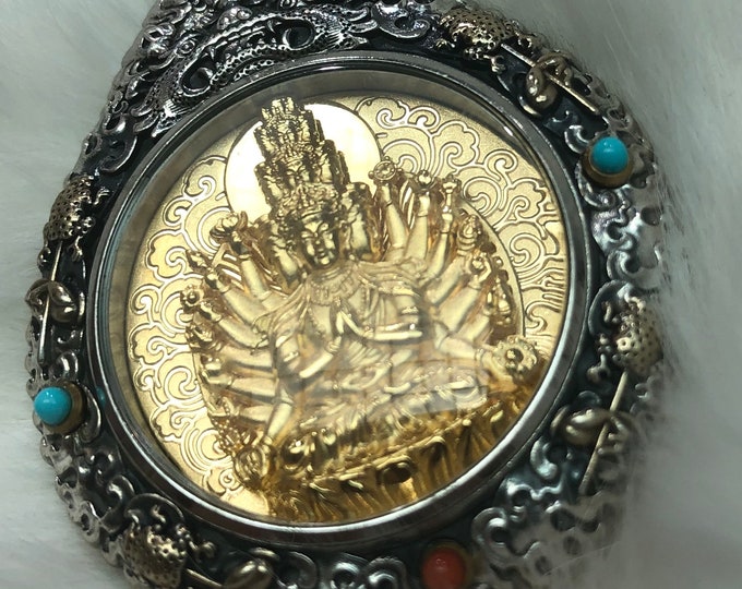 Tibetan Buddhist protection reliquary chenrezi thousand arms , solid silver 925 gold plated 18k turquoise nan hong. wheel of life