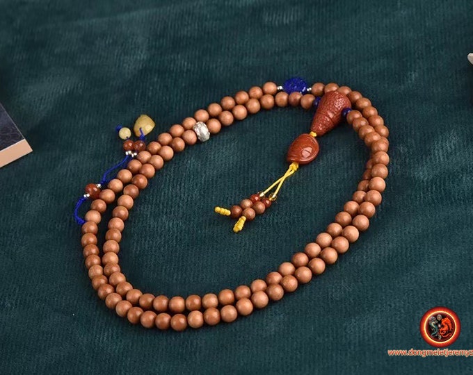 Mala, Tibetan mala, Buddhist rosary. 108 rare sandalwood beads and collection says, Laoshan sandalwood. Agate nan hong, Burmese amber.