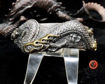 bracelet dragon. Jonc argent 925 et bronze. Artisanal. Argent Poinçonné. Dragon chinois, asiatique. travail fin et délicat, pièce rare.
