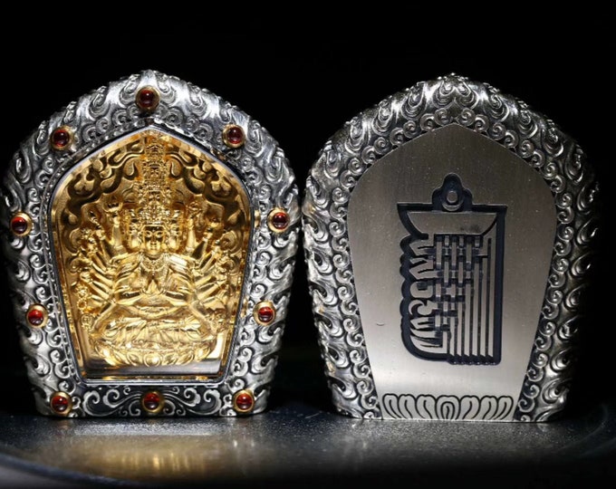 Tibetan Buddhist protection amulet, Chenrezi thousand arms, garnets, 18K gold plated silver, Kalachakra Tantra engraved on the back.