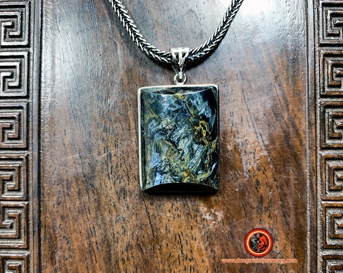 Pendant, pietersite exceptional quality set in 925 silver. Origin Namibia.appraised and natural guarantee without treatment.