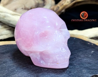Crystal skull. Skull carved in natural stone. Natural rose quartz skull. Unique piece. vanity, skull